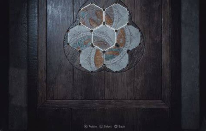 Leon Kennedy rotates two hexagons left once to solve the stone pedestal puzzle in Resident Evil 4 remake.