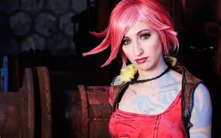 Lilith from Borderlands 2 smiles at the camera in Borderlands 3