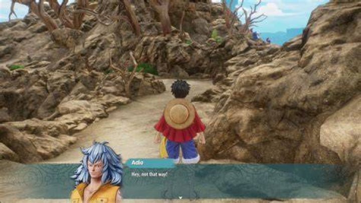 Luffy trying to explore the mysterious One Piece Odyssey island, but being told by Adio that he&rsquo;s going the wrong way.